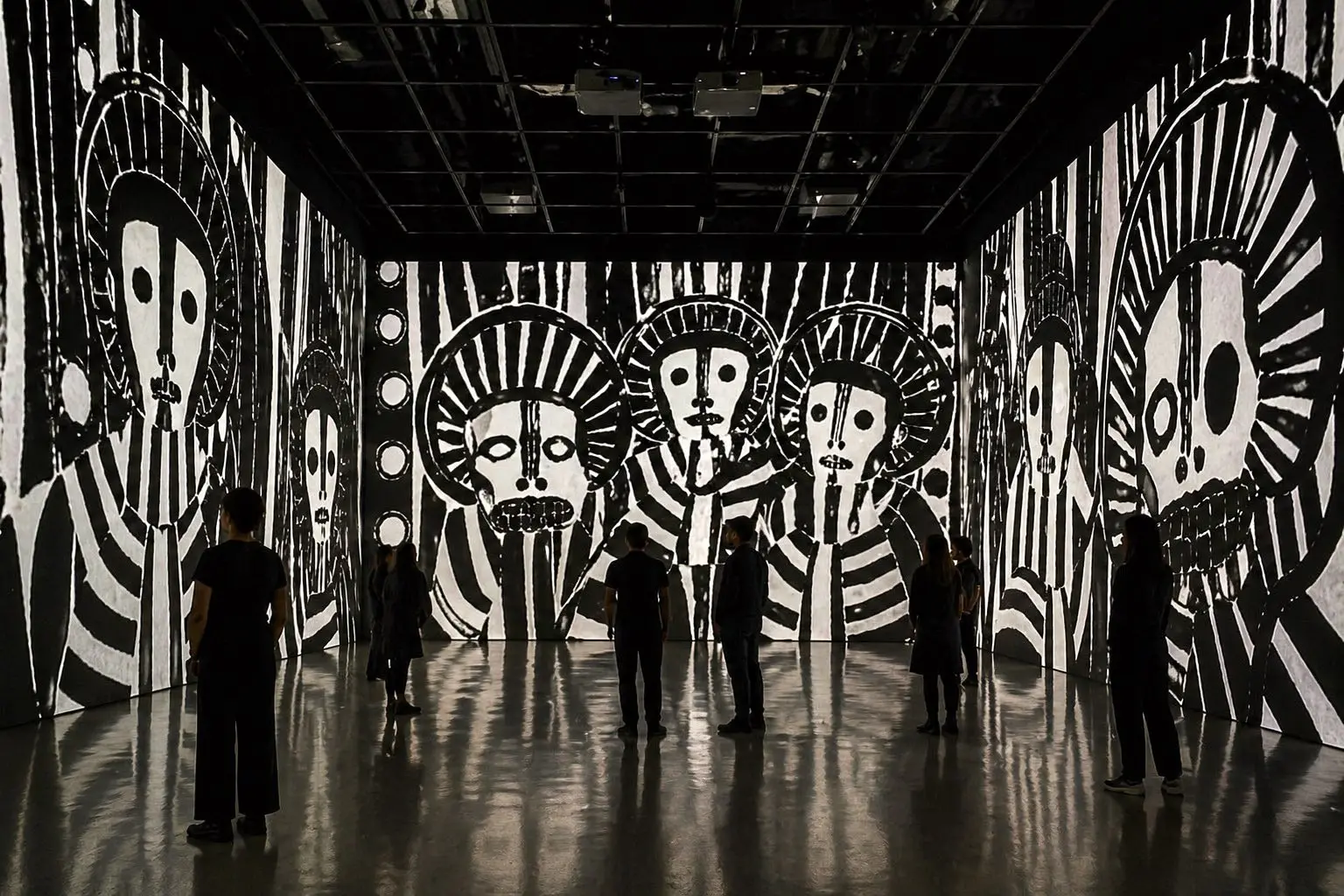 Simulation: a large industrial hall with red and black figures projected across columns and walls, visitors small against the scale.